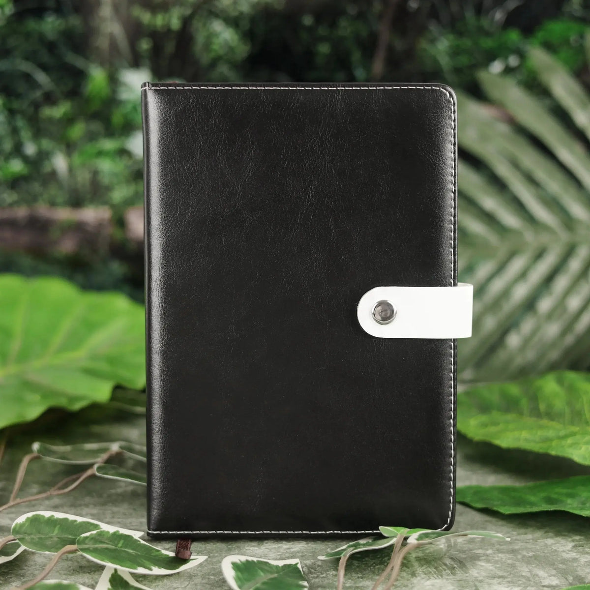 Classic Black Leather Notebook with White Strap Closure