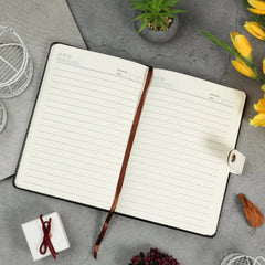 Classic Black Leather Notebook with White Strap Closure