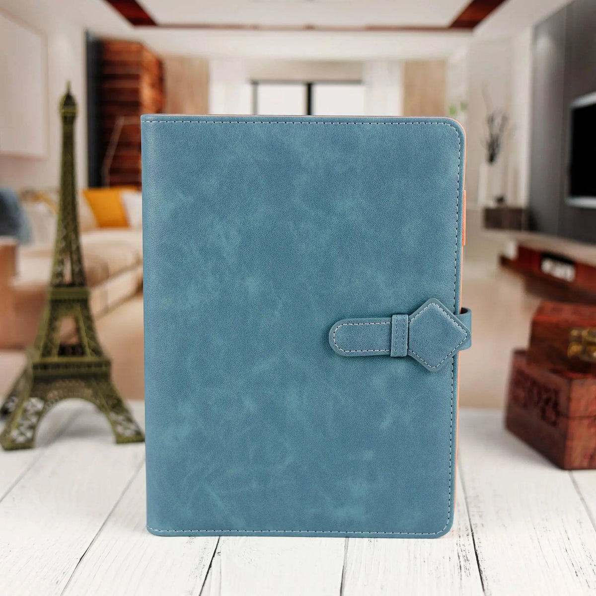 Elegant Blue Leather Notebook with Unique Strap Closure