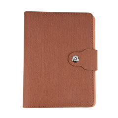 Elegant Brown Leather Notebook with Patterned Cover and Button Closure