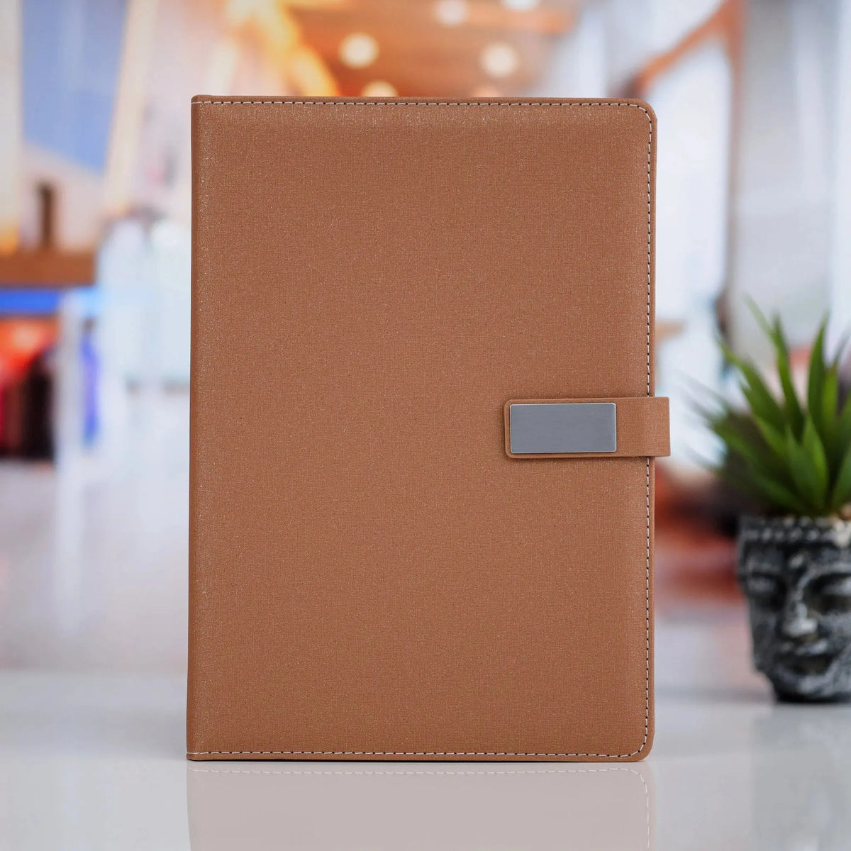 Elegant Tan Leather Notebook with Metal Clasp